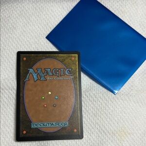 Magic: The Gathering Card with Blue Sleeve